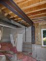 The beam on the other end of the master bedroom gets the same treatment
