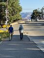 Brett and John mosey to the bus terminal