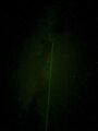 A green laser was used to point out targets to the audience