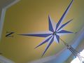 Elizabeth painted this compass rose on the dining room ceiling
